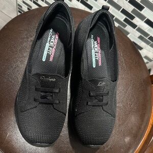 Skechers Women's Black Knit Slip-On Sneakers